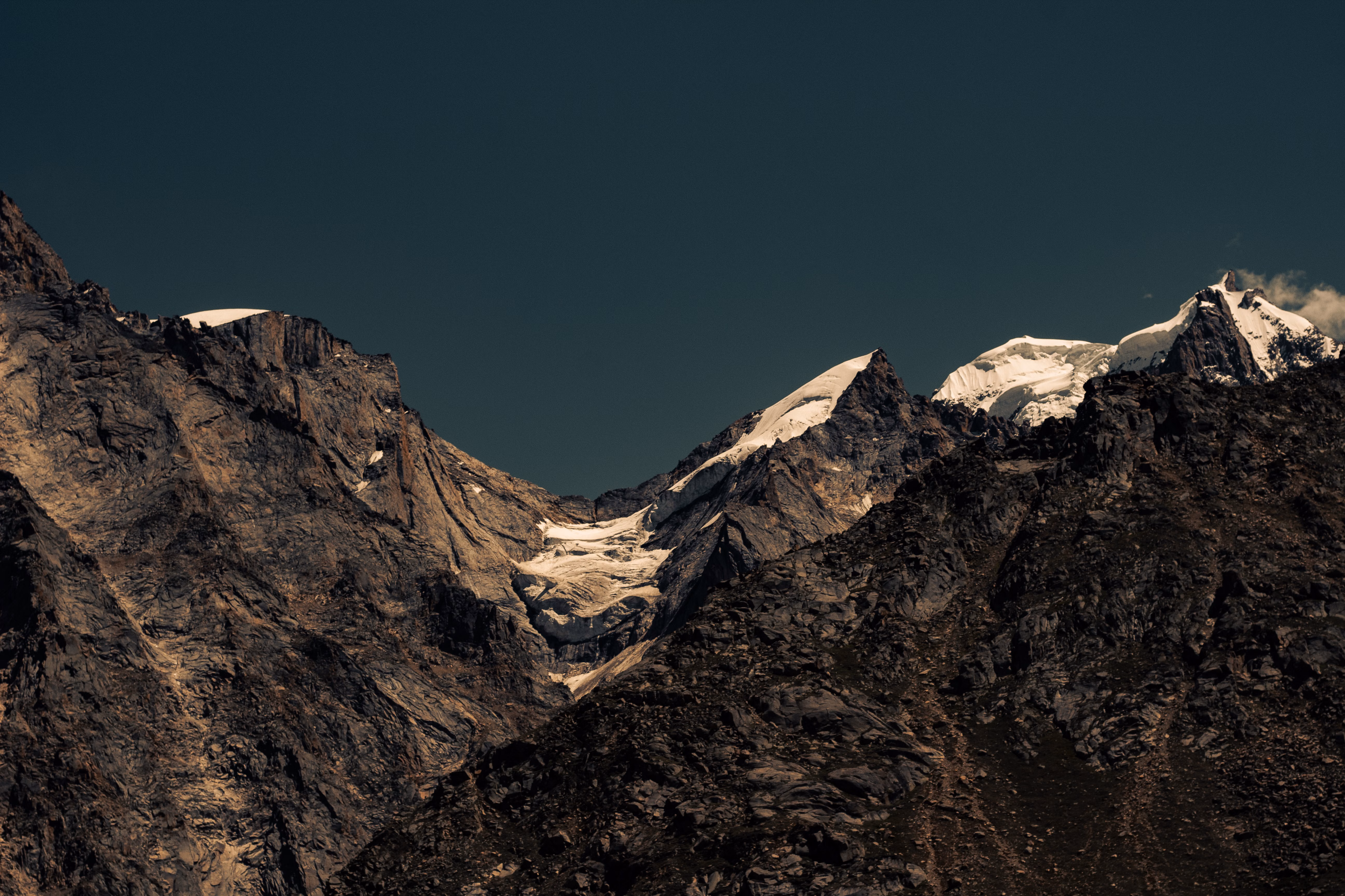 Background image of a mountain range with a lake in the foreground